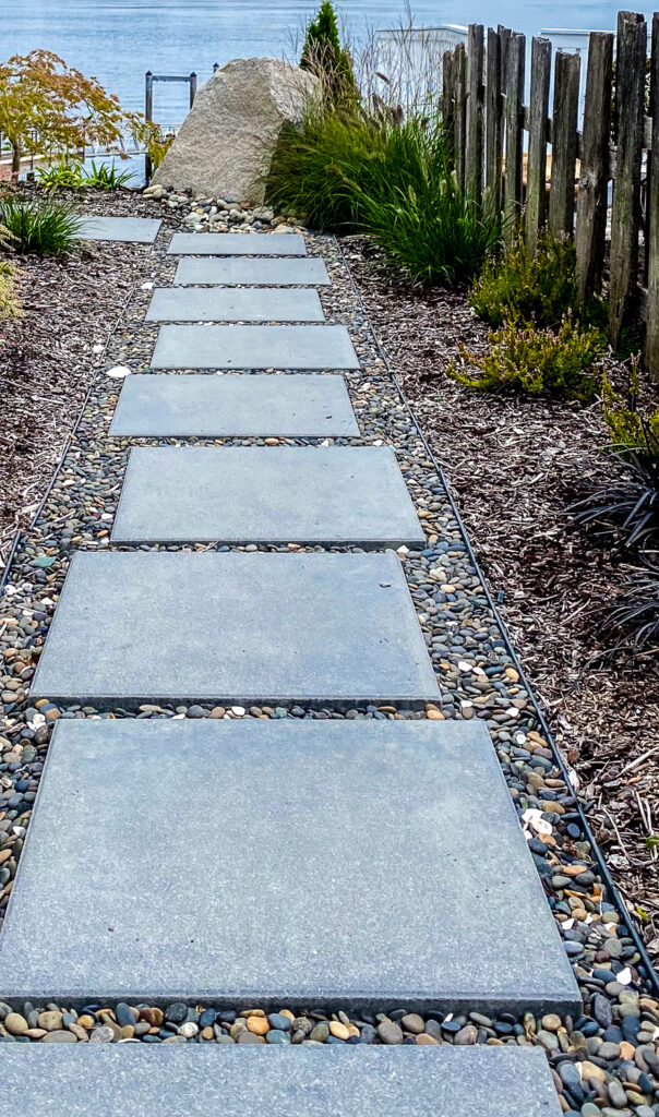 Visually appealing staggered concrete steps to beach in Gig Harbor, WA